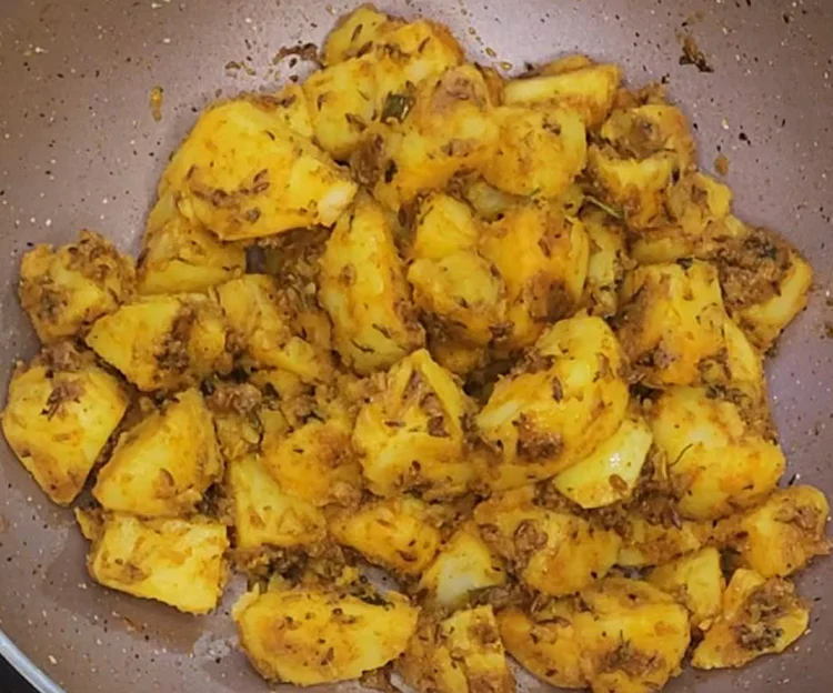 Coat Jeera Aloo with Masala